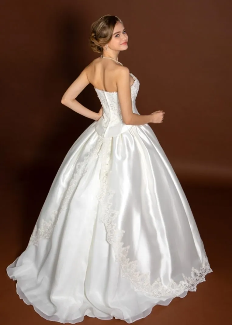 ---Delightful Satin Wedding Dress with top modeled by delicate tailoring cuts leaves of carved lace rest on the bodice, princely