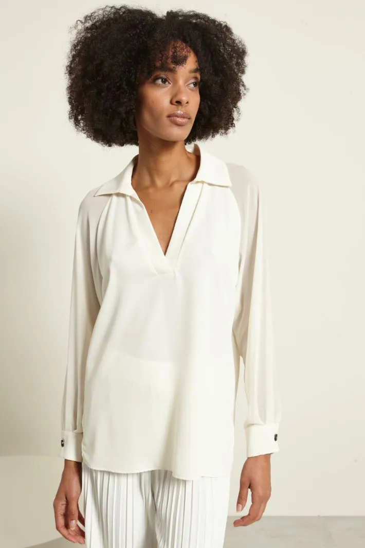 Blusa con maniche raglan