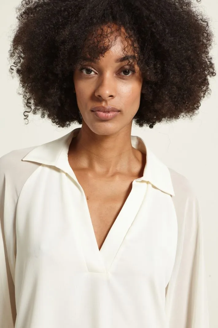 Blusa con maniche raglan