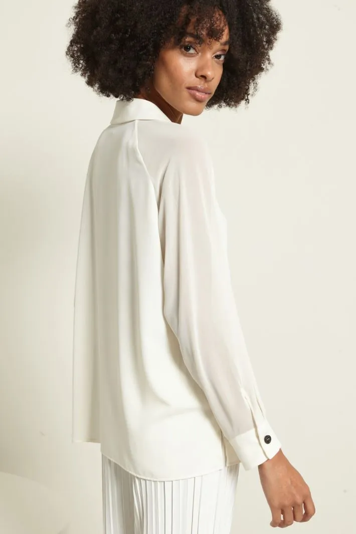Blusa con maniche raglan