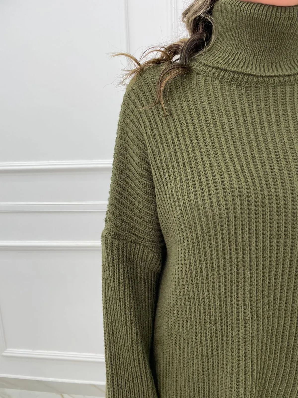 Coordinato in simil lana con maglia over e pantalone a zampa