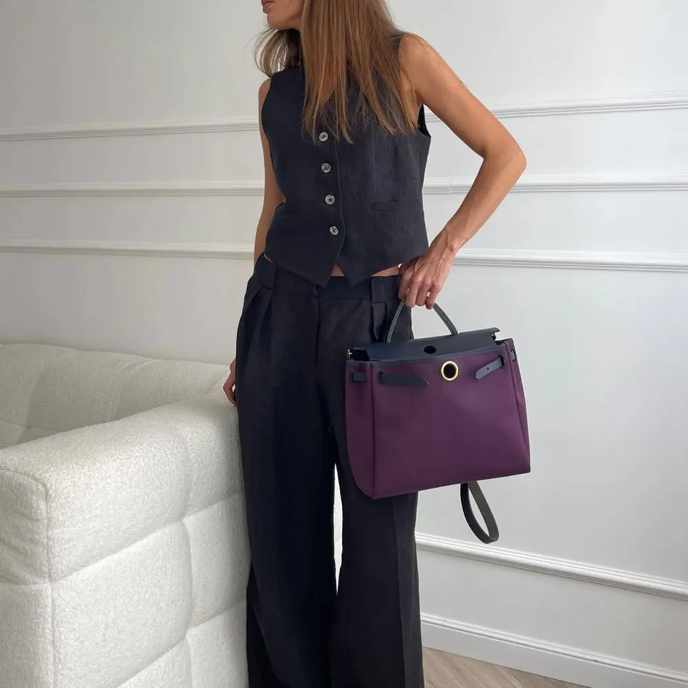 Gilet pantaloni casual set a due pezzi e 2024 primavera ed estate nuove donne moda gilet senza maniche pantaloni a vita bassa ve