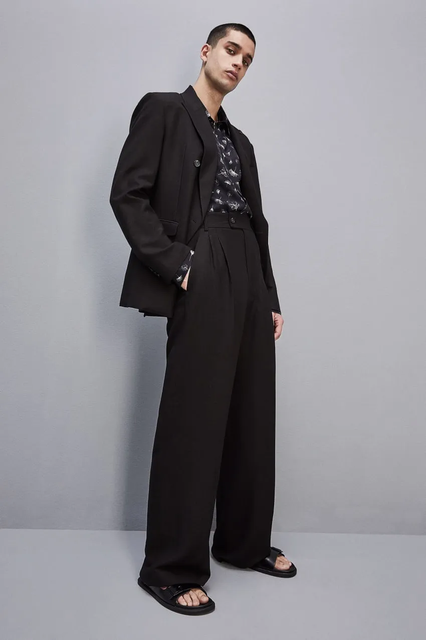 Pantalone con pinces misto lino e viscosa